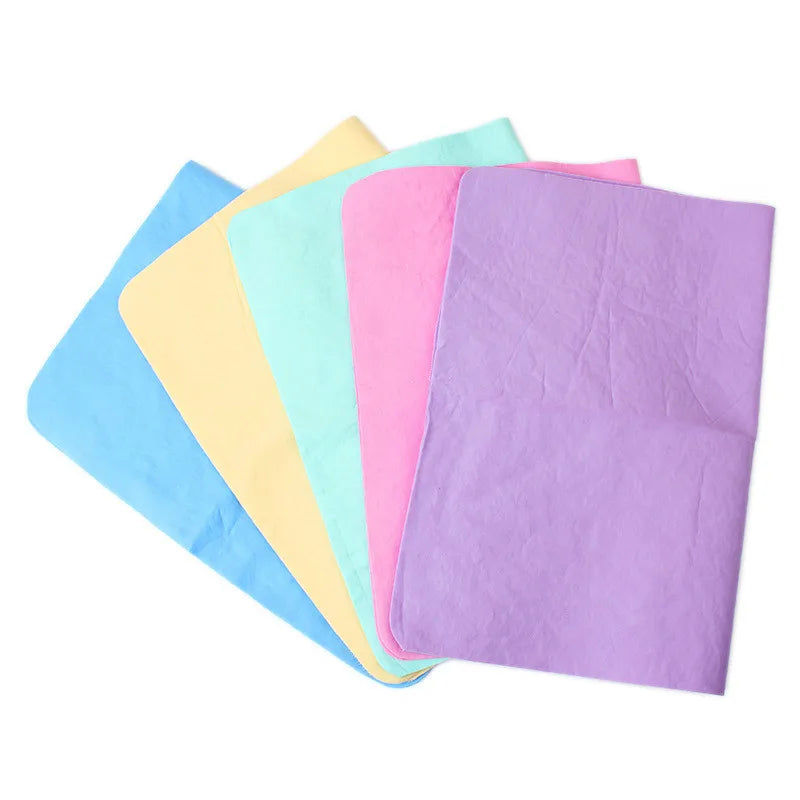 PVA pet towels laid flat in five colours
